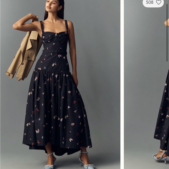 En Saison Dresses & Skirts - NWT En Saison Belted Drop Waist Black Midi Dress with playful heel pattern